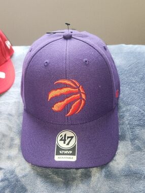 47 Purple Raptors Hat with Orange Claw Logo